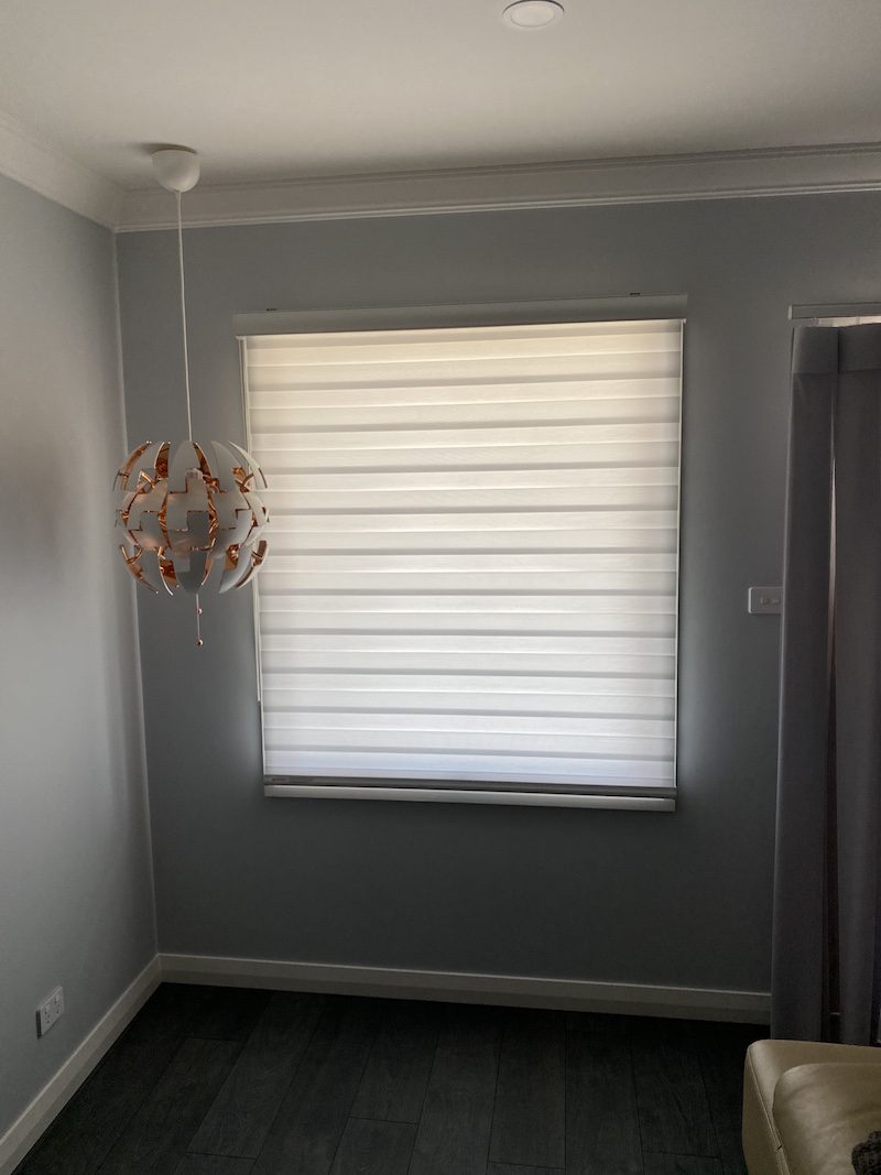 Zebra blinds are Roller shades that allow you to transition between sheer and privacy.